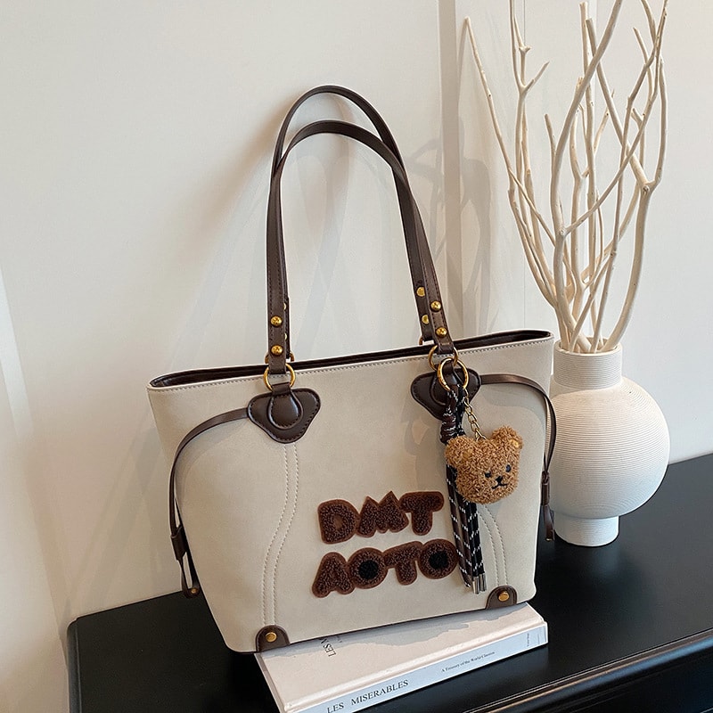 letter-patch-tote-bag-with-teddy-bear-charm