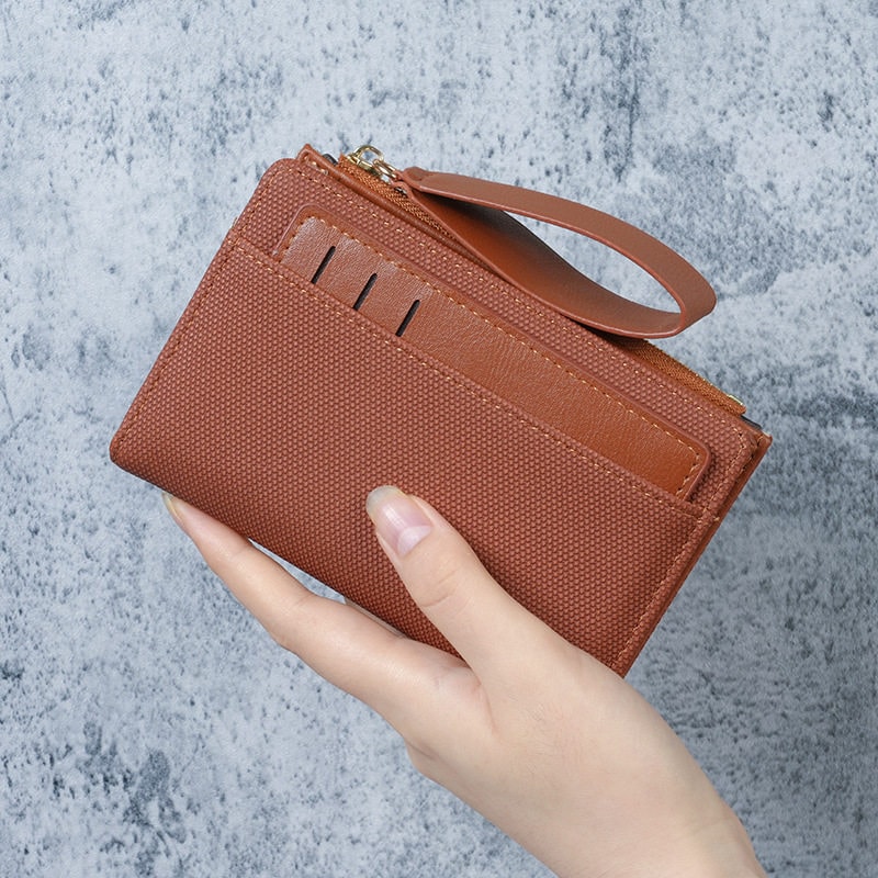 textured-bifold-mini-wallet-with-front-card-slots--wrist-strap